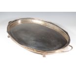 An oval silver plated galleried 2 handled tray 71cm