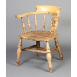 A 19th Century light elm bow chair with solid elm seat and double H framed stretcherThere is some