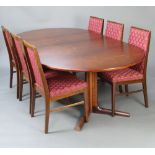A mid-Century oval rosewood extending dining table with 1 extra leaf 72cm h x 122cm w x 122cm long