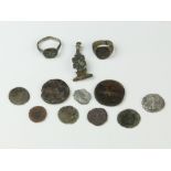 A quantity of Roman coins and artefacts