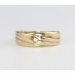 A 9ct yellow gold diamond set ring, size T, 3.3 grams