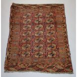 A Tekke Turkman rug with 21 octagons to the centre 154cm x 113cm