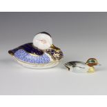 A Royal Crown Derby Imari paperweight in the form of a duck with silver stopper 10cm and a Beswick