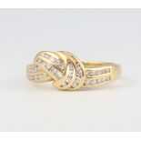 An 18ct yellow gold diamond crossover ring, 4.8 grams, size Q