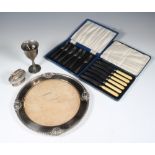 A silver plated mounted bread board, 2 cased sets and minor plated wares etc