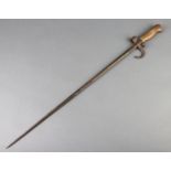 A French Lebel M1886/35 short cruciform bayonetThere is some rust to the blade, moving parts are