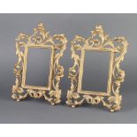 A pair of pierced gilt metal rococo style easel photograph frames 27cm x 19cm x 9cm