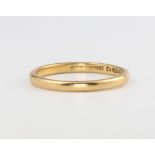 A 22ct yellow gold wedding band, size L 1/2, 2.1 grams