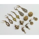 Seven pairs of vintage earrings