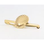 A 9ct yellow gold Shell bar brooch, 35mm, 3.1 grams gross