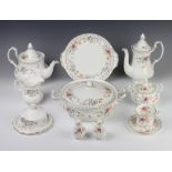 A Royal Albert Jubilee Rose tea, coffee and dinner service comprising 12 dinner plates (seconds), 16