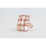 A 9ct rose gold paste set dress ring, 4.5 grams, size N