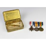 A World War One trio of medals to 370 Pte. S.J.Phillmore E.Surr.R together with a 1914 Christmas tin