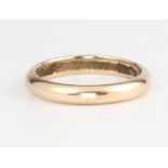 A 9ct yellow gold wedding band, size L 1/2, 3 grams