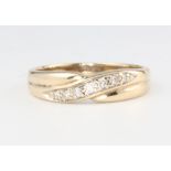 A 9ct yellow gold diamond ring 2.7 grams, size P