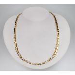 An 18ct yellow gold diamond set necklace, 43cm, 34.4 grams