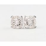 A pair of 9ct white gold diamond ear studs, each set with 15 brilliant cut diamonds, 1 gram, 6mm