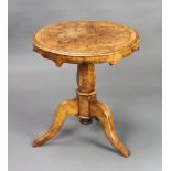 A Victorian circular inlaid figured walnut occasional/wine table with quarter veneered top raised on