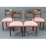 A set of 4 Georgian mahogany bar back dining chairs with carved rope mid rails and over stuffed
