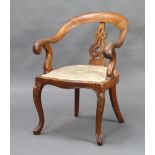 A Victorian oak tub back office chair with pierced vase shaped slat back, seat of serpentine