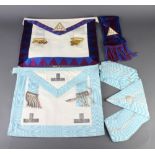 A Past Masters apron and collar and a Royal Arch companions apron and sash
