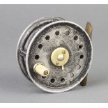 An Alcocks 3" trout fly fishing reel with 2 screw drum latch and stag trademark