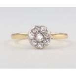 An 18ct yellow gold 8 stone diamond cluster ring approx. 0.25ct, 3.2 grams, size O