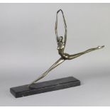 A 20th Century bronze figure of a leaping female 46cm h x 65cm w raised on a black marble base