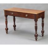A Victorian mahogany side table fitted 2 drawers with oval plate drop handles raised on turned