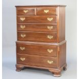 Ethan Allen, a Georgian style mahogany chest on chest, the upper section with moulded cornice and