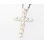 A 14 white gold diamond set cross pendant on a silver chain, diamonds approx. 2.20ct, 30mm, 4.7