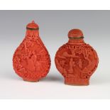 Two modern Cinnabar lacquer scent bottles decorated with figures in pavillion landscapes 6cm and 7cm