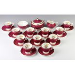 A Cauldon matched coffee set comprising 11 coffee cups, 12 saucers, a lidded sugar bowl, cream jug