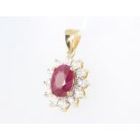 A 9ct oval ruby and diamond pendant, the centre stone approx. 1.85ct, the brilliant cut diamonds