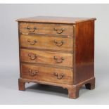A Georgian bleached mahogany commode converted to a chest of 4 drawers with brass ring neck drop