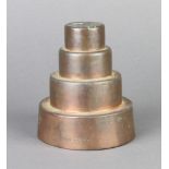 Harrods Ltd, a 20th Century cylindrical copper 4 tier tapered jelly/ice cream mould 11cm x 9cm