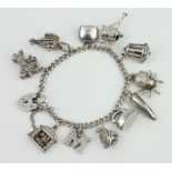 A silver charm bracelet 53 grams