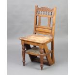 A late Victorian metamorphic carved oak 4 tread library steps in the form of a bar back chair with