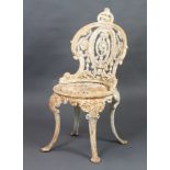 A white painted Colebrookdale style garden chair raised on cabriole supports