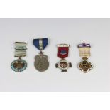 A silver and enamel Royal Masonic Benevolent Institution jewel 1929 and 3 others