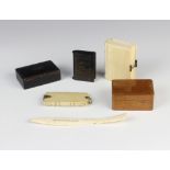 A Victorian ivory purse in the form of a book, an aide memoire, 2 trinket boxes, a vesta and