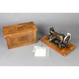 W J Harris & Co, a manual sewing machine no. 889 910 complete with instructions and carrying case