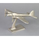 An Art Deco style chrome model of a twin engined aircraft 9cm x 18cm x 23cm