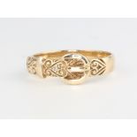 A 9ct yellow gold buckle ring 3 grams, size R