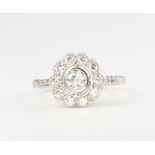 An Edwardian style 11 stone diamond cluster ring, approx. 0.75ct, size O 1/2, 4.6 grams