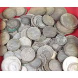 A quantity of pre-1947 coins, 690 grams