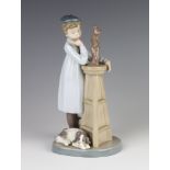 A Lladro figure of a boy sculptor 5358 20cm