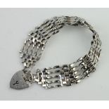 A silver gatelink bracelet and padlock, 19 grams
