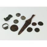 A quantity of Roman coins and artefacts