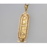 A 9ct yellow gold Egyptian design pendant and necklace 5.6 grams